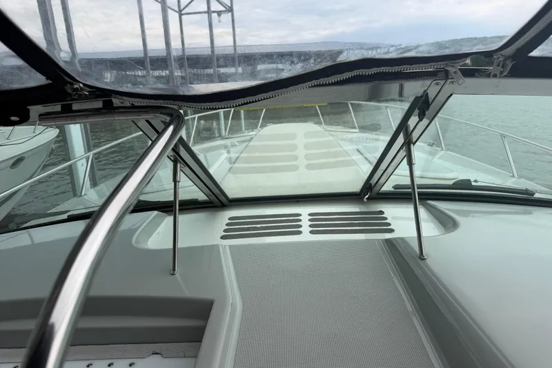 Slide: The Image of 2007 Formula 400 Super Sport boat deck view with windshield and railing. - 23