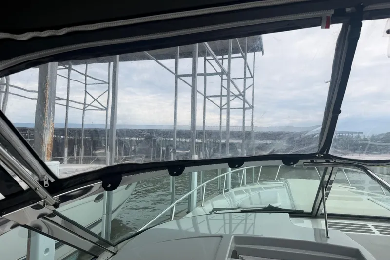 Slide: The Image of 2007 Formula 400 Super Sport boat docked, view from cockpit through clear canopy. - 24