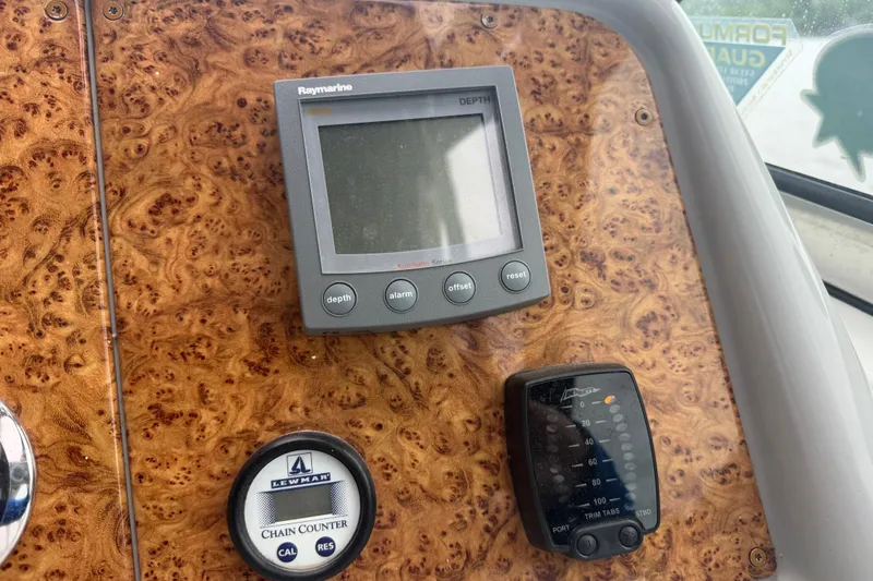 Slide: The Image of Control panel of a 2007 Formula 400 Super Sport boat with Raymarine display. - 29