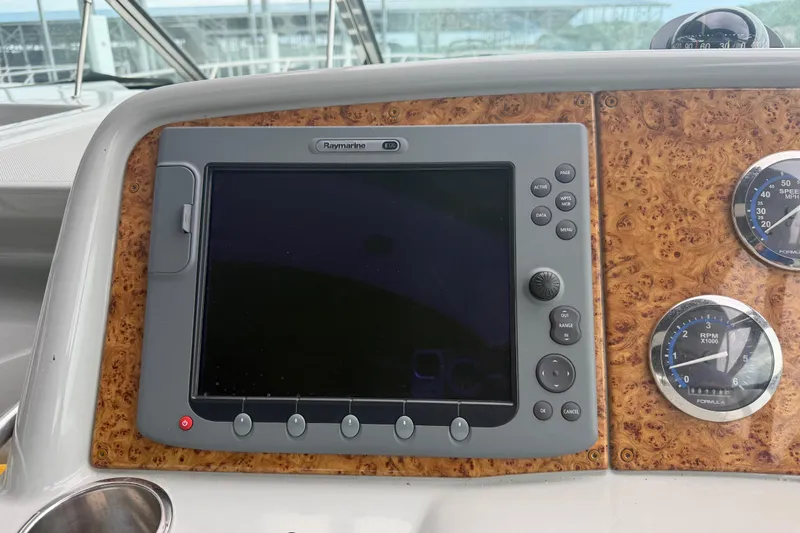 Slide: The Image of Dashboard of a 2007 Formula 400 Super Sport with Raymarine display and gauges. - 30