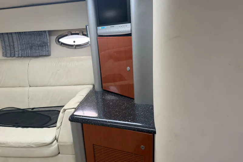 Slide: The Image of Interior of 2007 Formula 400 Super Sport yacht with TV and seating area. - 34