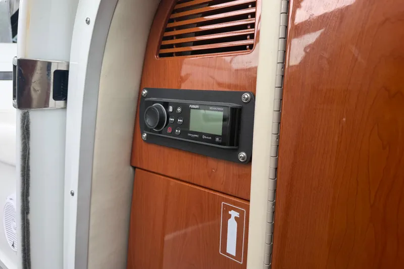 Slide: The Image of Control panel on 2007 Formula 400 Super Sport boat with wood finish. - 38