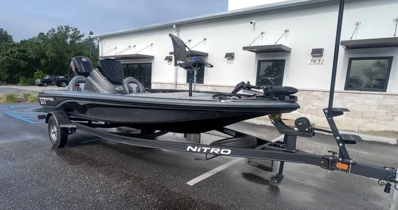 Slide: The Image of 2022 Nitro Z17 boat on trailer in front of building. - 3