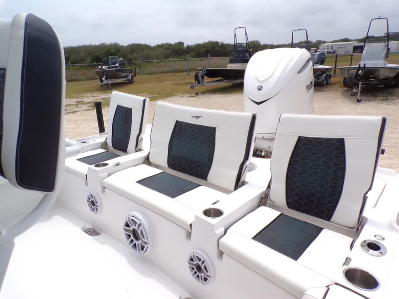 Slide: The Image of Interior of 2026 Tidewater 2500 Carolina Bay with luxurious seating. - 11