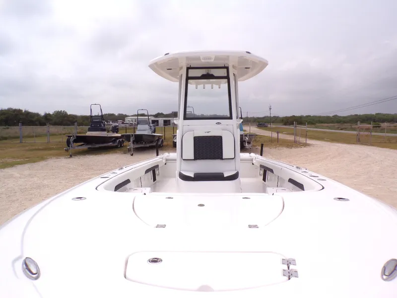 Slide: The Image of 2026 Tidewater 2500 Carolina Bay boat on a gravel lot. - 20