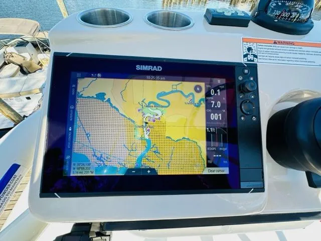 Slide: The Image of Simrad navigation display on 2023 Boston Whaler 360 Outrage boat. - 44
