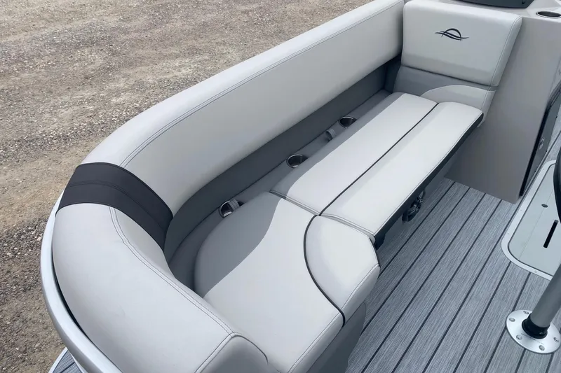 Slide: The Image of Luxurious seating on 2026 SunCatcher Select 322RC pontoon boat with sleek design and cup holders. - 10