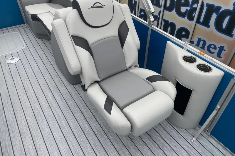 Slide: The Image of Luxurious seating on 2026 SunCatcher Select 322RC boat with cup holders and sleek design. - 11