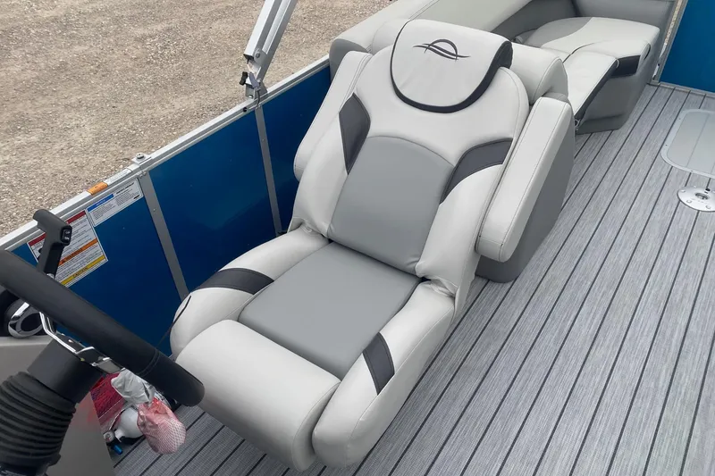 Slide: The Image of Luxurious seating on 2026 SunCatcher Select 322RC pontoon boat with modern design. - 12
