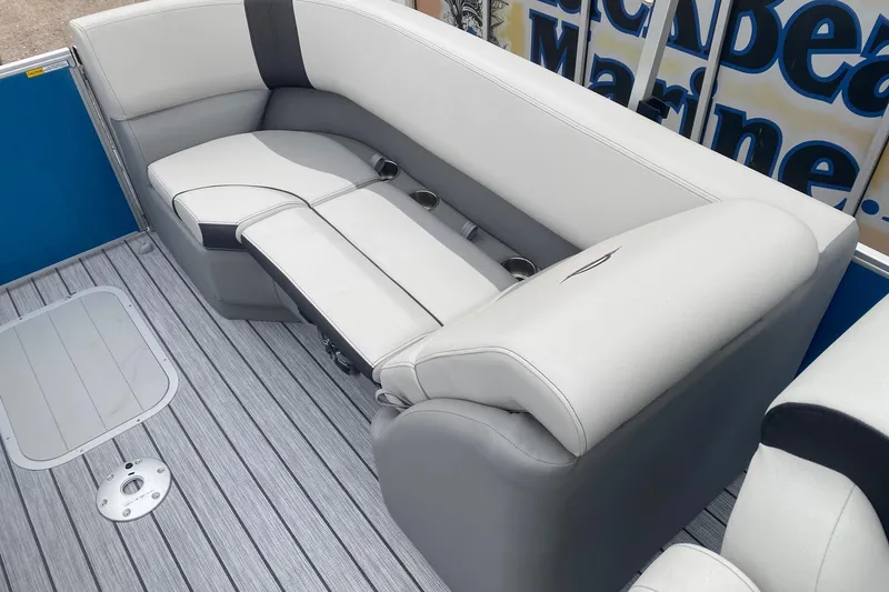 Slide: The Image of Luxurious seating on 2026 SunCatcher Select 322RC pontoon boat with sleek design and cup holders. - 13