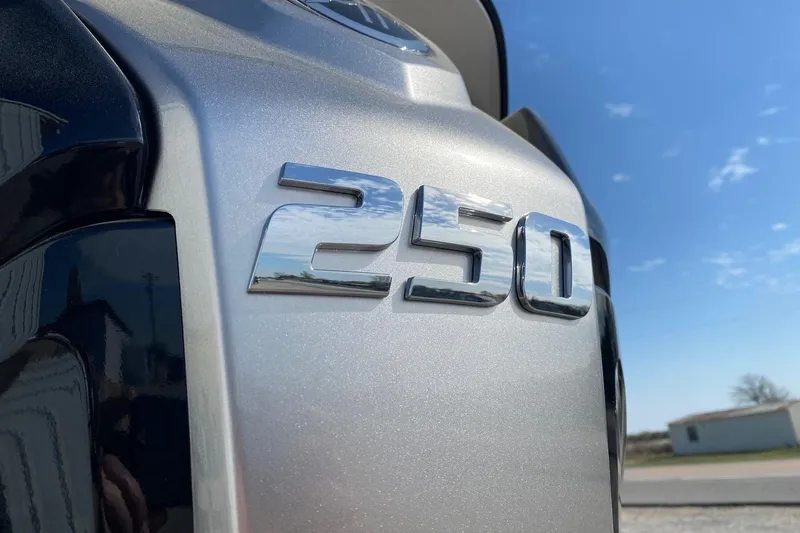 Slide: The Image of Close-up of SunCatcher Select 322RC 2026 model with '250' emblem under blue sky. - 5