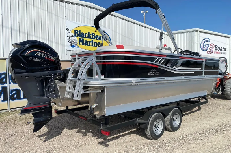Slide: The Image of 2026 SunCatcher Select 322RC pontoon boat on trailer at BlackBear Marine dealership. - 6