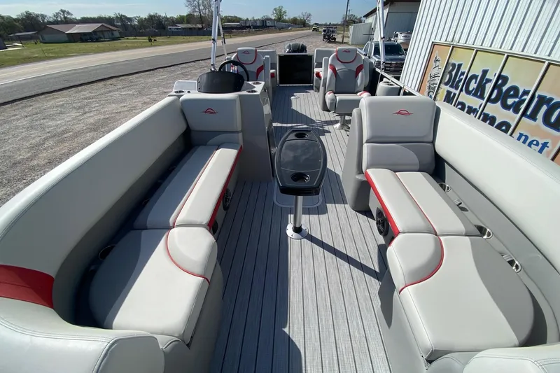 Slide: The Image of 2026 SunCatcher Select 322RC pontoon boat interior with spacious seating and modern design. - 7