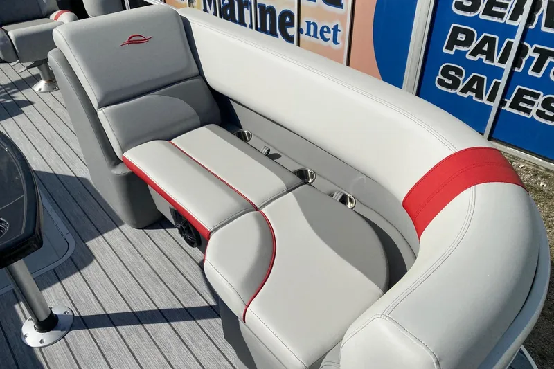 Slide: The Image of Luxurious seating on 2026 SunCatcher Select 322RC pontoon boat with stylish red accents. - 8