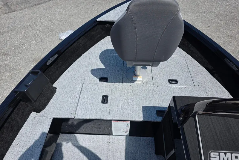 Slide: The Image of 2026 Smoker Craft Pro Angler 165 SC boat interior with seating and storage compartments. - 9