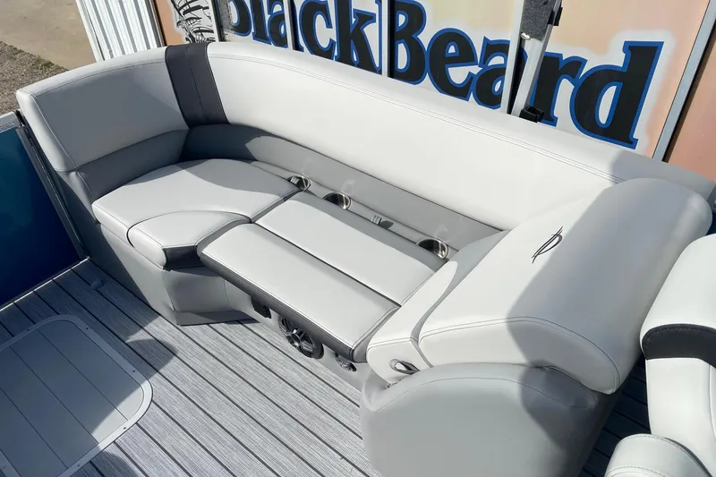 Slide: The Image of Luxurious seating on 2026 SunCatcher Select 322RC pontoon boat, featuring sleek design and comfort. - 11