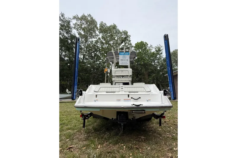 The Image of 2020 Yamaha Boats 195 FSH Sport on trailer, displayed outdoors with "For Sale" sign. - 0
