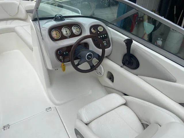 Slide: The Image of Interior of a 2006 Chaparral 210 SSi boat with steering console. - 11