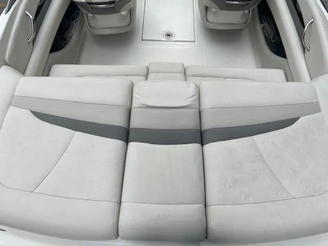Slide: The Image of Interior of a 2006 Chaparral 210 SSi boat with gray upholstery. - 8