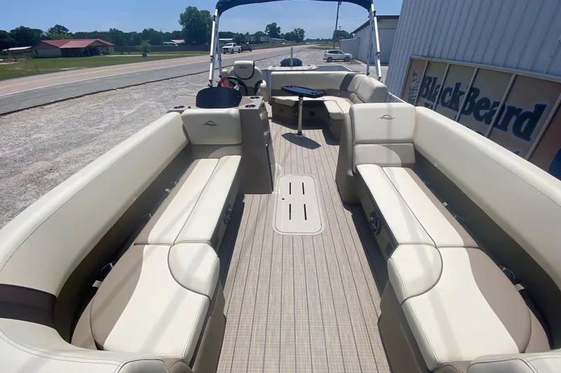 Slide: The Image of 2026 SunCatcher Select 322RF pontoon boat with spacious seating and modern design. - 7