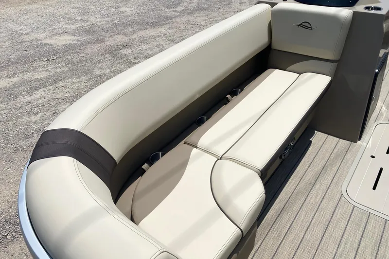 Slide: The Image of Luxurious seating on 2026 SunCatcher Select 322RF pontoon boat, featuring beige upholstery. - 9