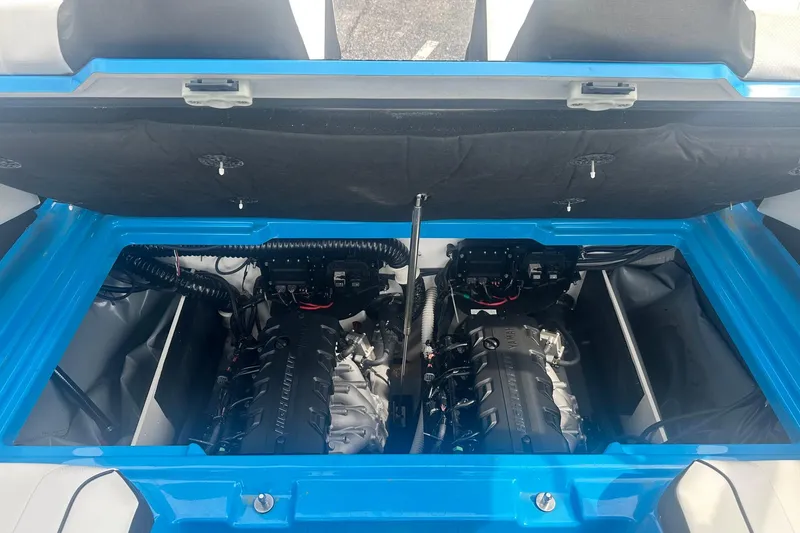 Slide: The Image of 2023 Yamaha Boats 222XD engine compartment with dual engines visible. - 18