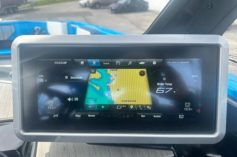 Slide: The Image of Yamaha Boats 2023 222XD dashboard display showing navigation and water temperature at 67°F. - 24