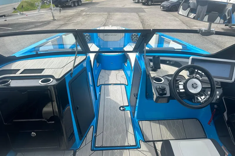 Slide: The Image of 2023 Yamaha Boats 222XD interior with modern dashboard and steering wheel. - 30