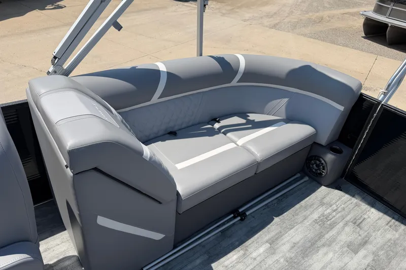 Slide: The Image of 2023 Crest Classic DLX 240 SLC pontoon boat with stylish gray seating and modern design. - 20