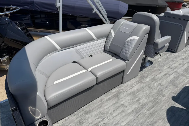 Slide: The Image of 2023 Crest Classic DLX 240 SLC pontoon boat with luxurious gray seating and modern design. - 22