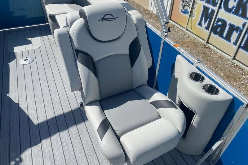 Slide: The Image of Luxurious seating on 2026 SunCatcher Select 322RC boat with cup holders and sleek design. - 10