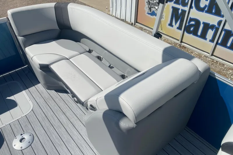 Slide: The Image of Luxurious seating on 2026 SunCatcher Select 322RC pontoon boat, featuring sleek gray upholstery. - 12