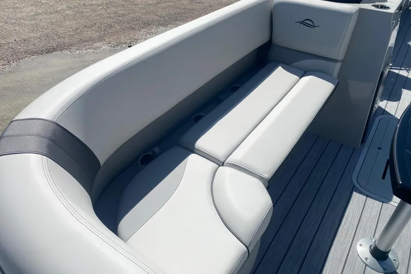 Slide: The Image of Luxurious seating on 2026 SunCatcher Select 322RC boat, featuring sleek gray upholstery. - 9