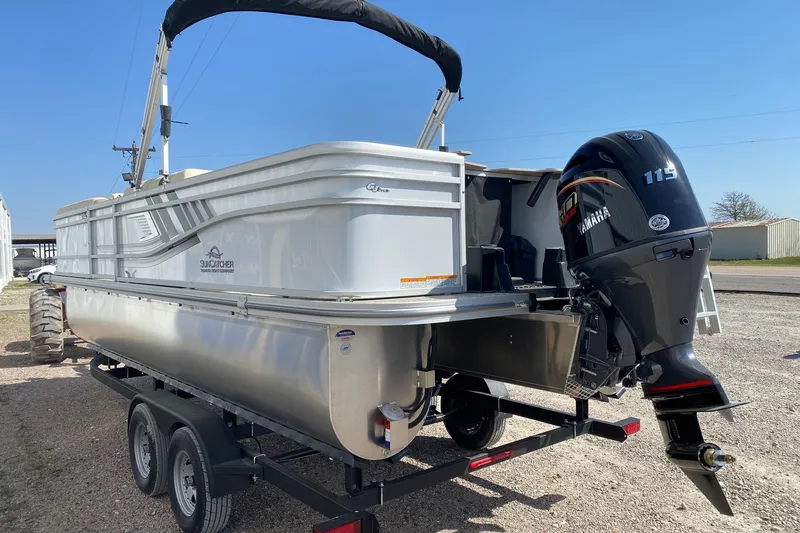 Slide: The Image of 2026 SunCatcher Select 22RF pontoon boat with Yamaha 115 engine on trailer. - 4