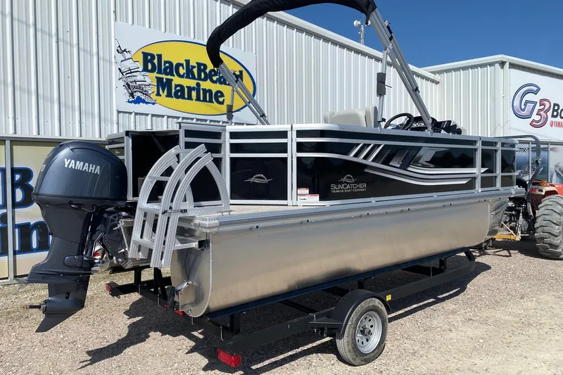 Slide: The Image of 2026 SunCatcher Select 18F pontoon boat with Yamaha motor at BlackBeard Marine dealership. - 6