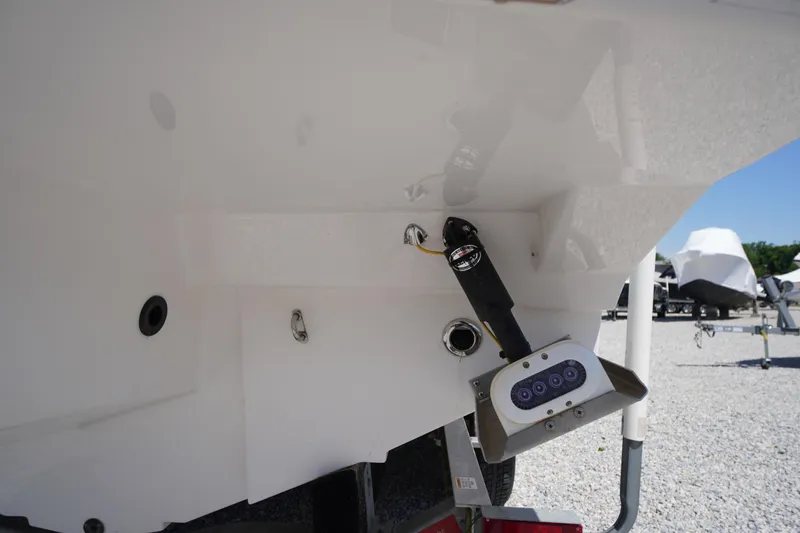 Slide: The Image of 2019 Cutwater C-242 Sport Coupe boat hull with trim tab and sensor details. - 10