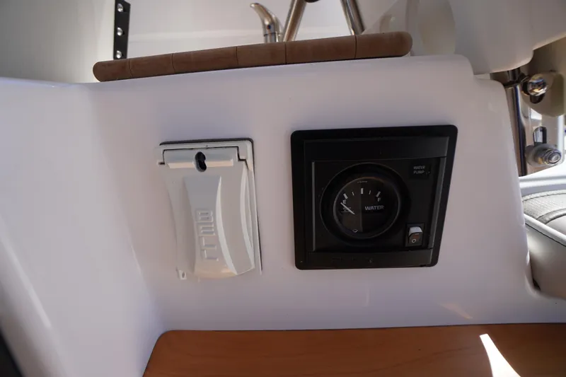 Slide: The Image of 2019 Cutwater C-242 Sport Coupe water gauge and control panel. - 33