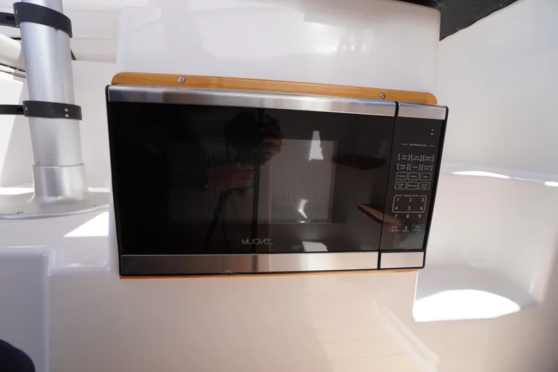Slide: The Image of Microwave inside 2019 Cutwater C-242 Sport Coupe boat interior. - 39