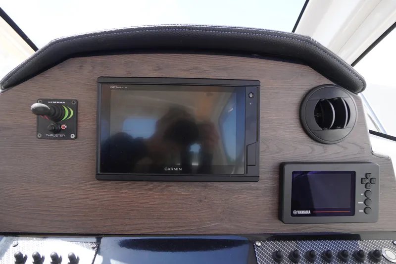 Slide: The Image of Dashboard of 2019 Cutwater C-242 Sport Coupe with Garmin and Yamaha displays. - 49