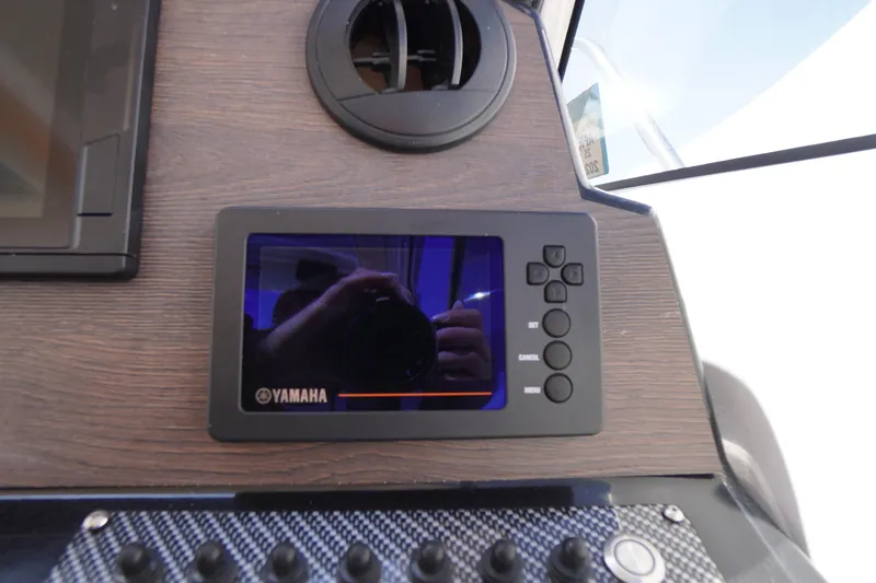 Slide: The Image of Dashboard of 2019 Cutwater C-242 Sport Coupe featuring Yamaha display screen. - 51