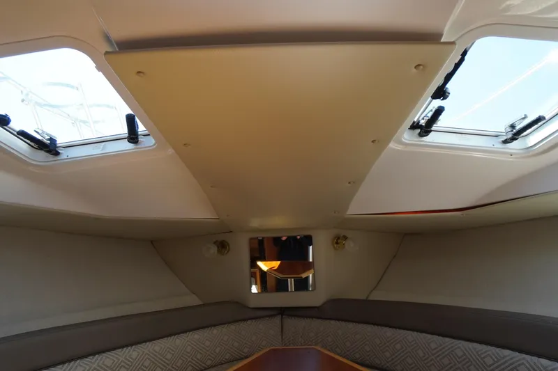 Slide: The Image of Interior cabin view of 2019 Cutwater C-242 Sport Coupe with skylights and seating area. - 59