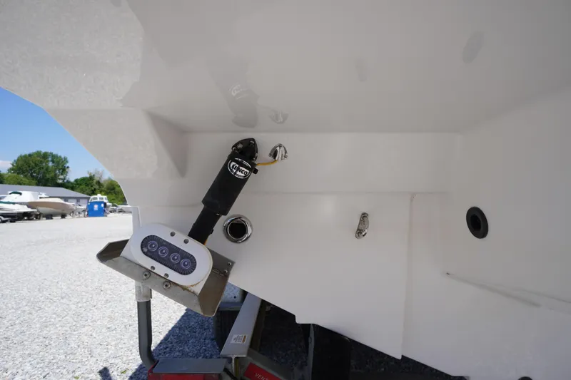 Slide: The Image of 2019 Cutwater C-242 Sport Coupe boat stern with trim tab and hydraulic components. - 9