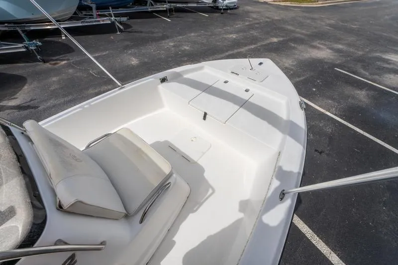 Slide: The Image of 2005 Century 1902 Inshore boat interior with seating and storage compartments. - 13