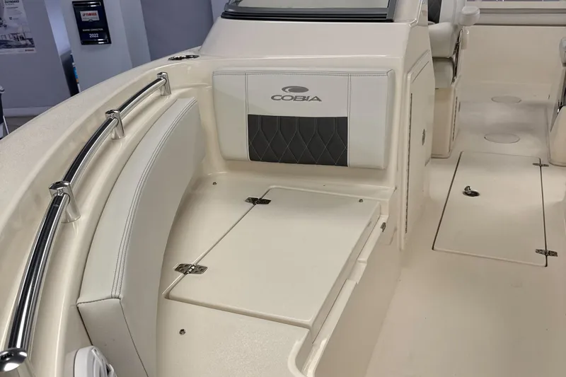 Slide: The Image of Interior view of the 2024 Cobia 220 Dual Console boat. - 12