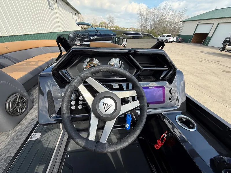 Slide: The Image of Interior view of Viaggio Lago Z 24 S 2026 boat with steering wheel and dashboard. - 17