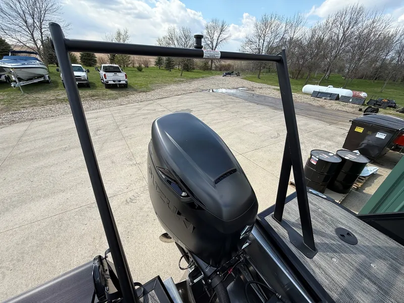 Slide: The Image of Viaggio Lago Z 24 S 2026 with outboard motor in parking area. - 27