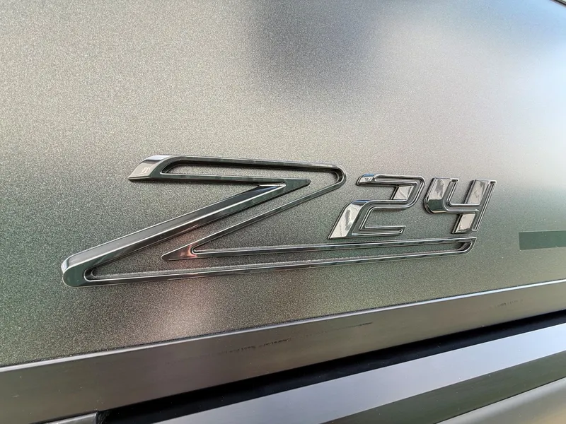 Slide: The Image of Viaggio Lago Z 24 S 2026 emblem on silver background. - 8