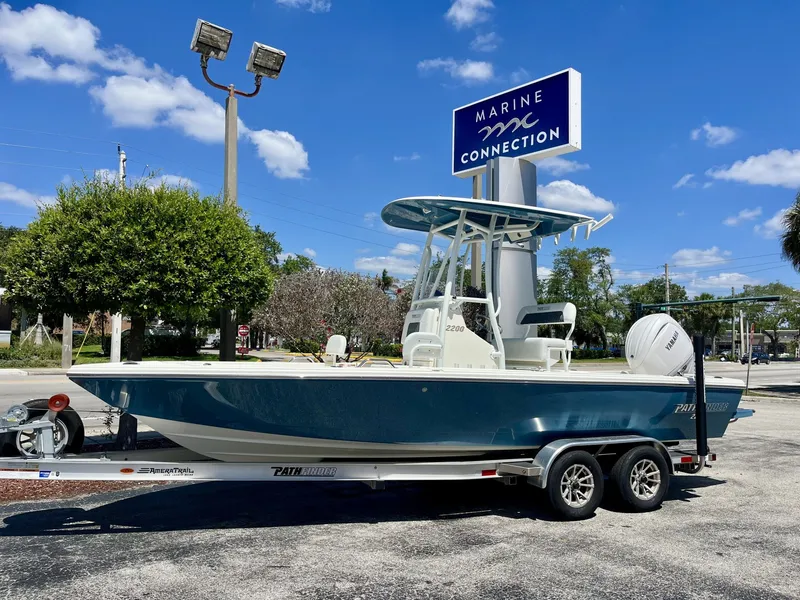 The Image of 2026 Pathfinder 2200 TRS boat on trailer at Marine Connection. - 1