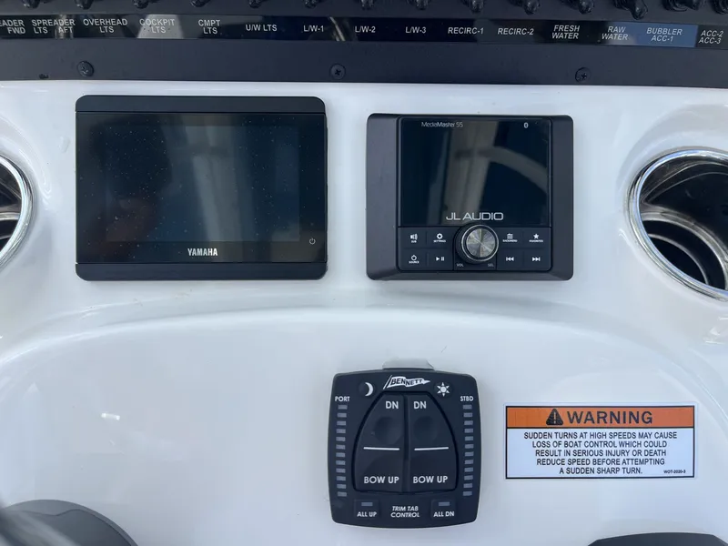 Slide: The Image of Pathfinder 2200 TRS 2026 boat console with Yamaha and JL Audio controls. - 13