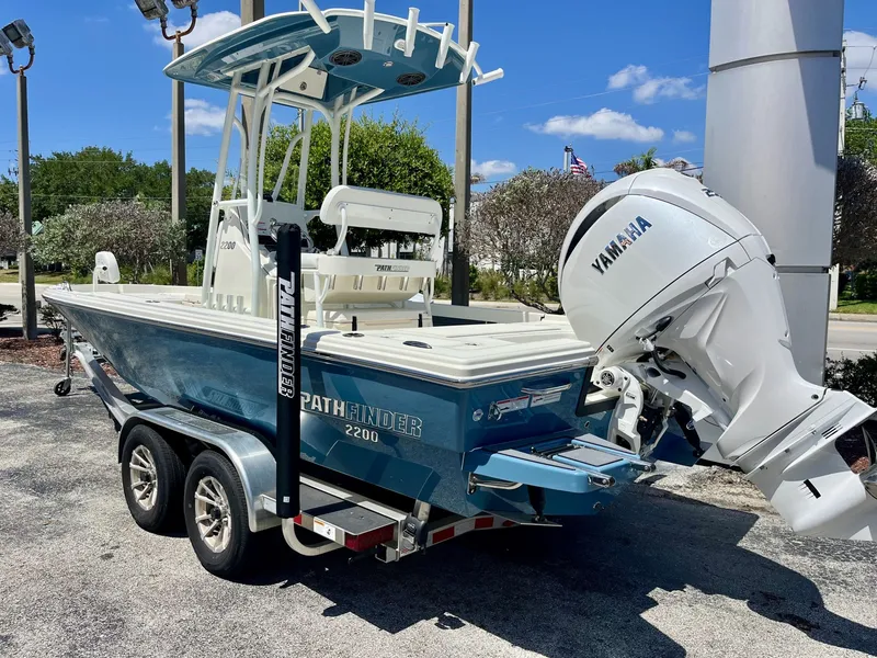 Slide: The Image of 2026 Pathfinder 2200 TRS boat with Yamaha outboard motor. - 4